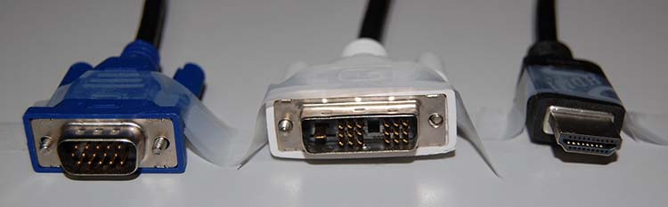 Picture of three standard monitor connector interfaces: VGA, DVI, and HDMI.
